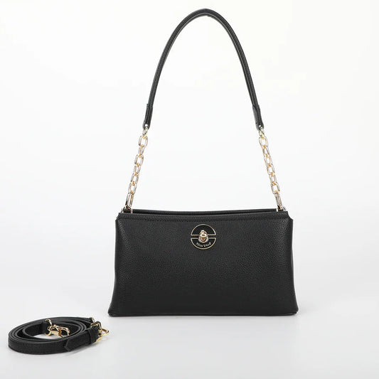 BORSA A TRACOLLA CON CHIUSURA VERNICIATA IN TINTA